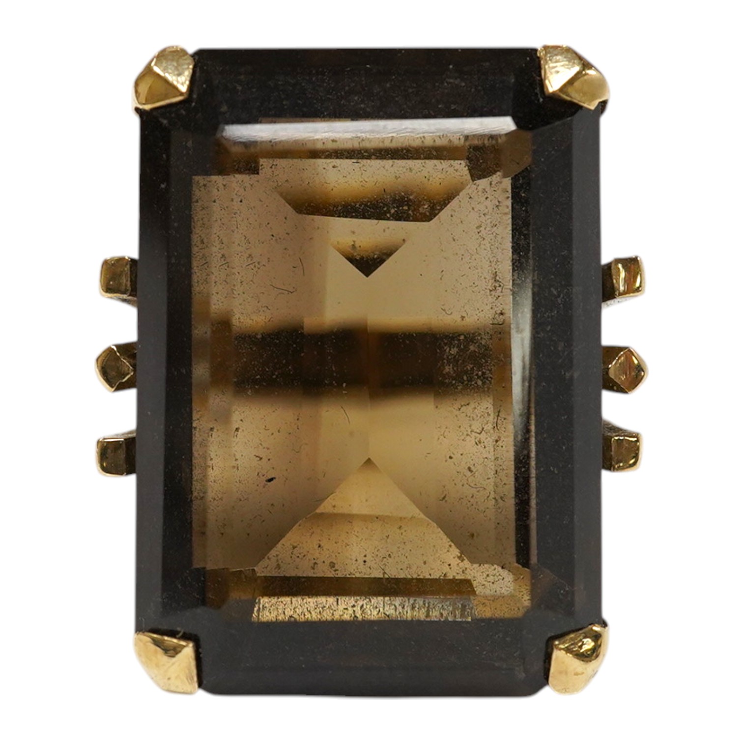 A 9ct and large single stone emerald cut smoky quartz set dress ring, size P, gross weight 14.9 grams. Condition - good